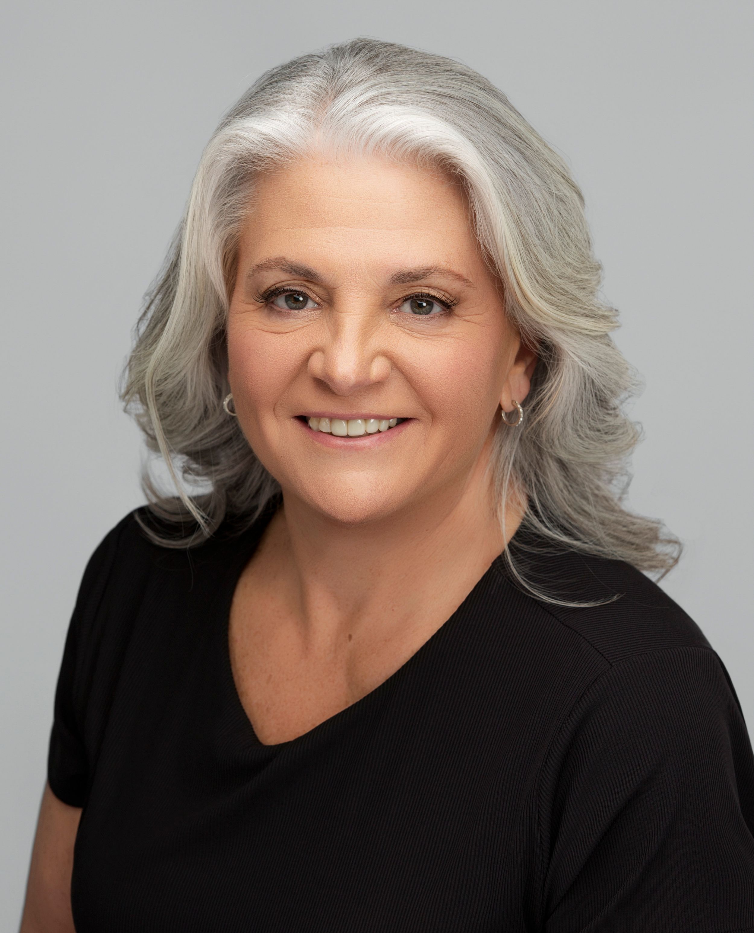 senior woman gray hair modeling portfolio studio natural portraits minimal retouch elegant mature model Sarasota