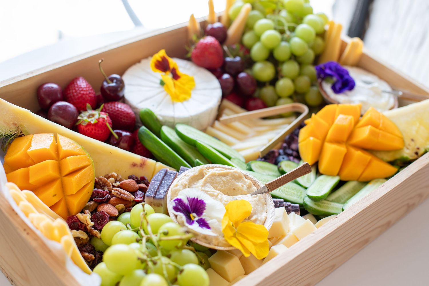Charcuterie food at Chasing Cali Collective featuring styled grazing board with meats, cheeses, fruit, and elegant event presentation photog