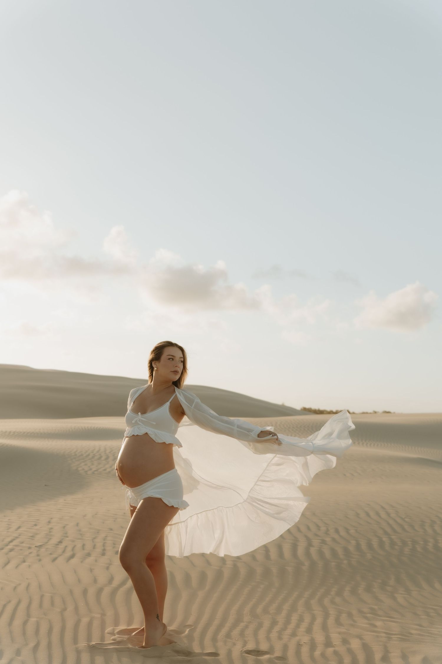 Maternity photoshoot in the sand dunes just north of Newcastle NSW. Solo maternity photos of pregnancy