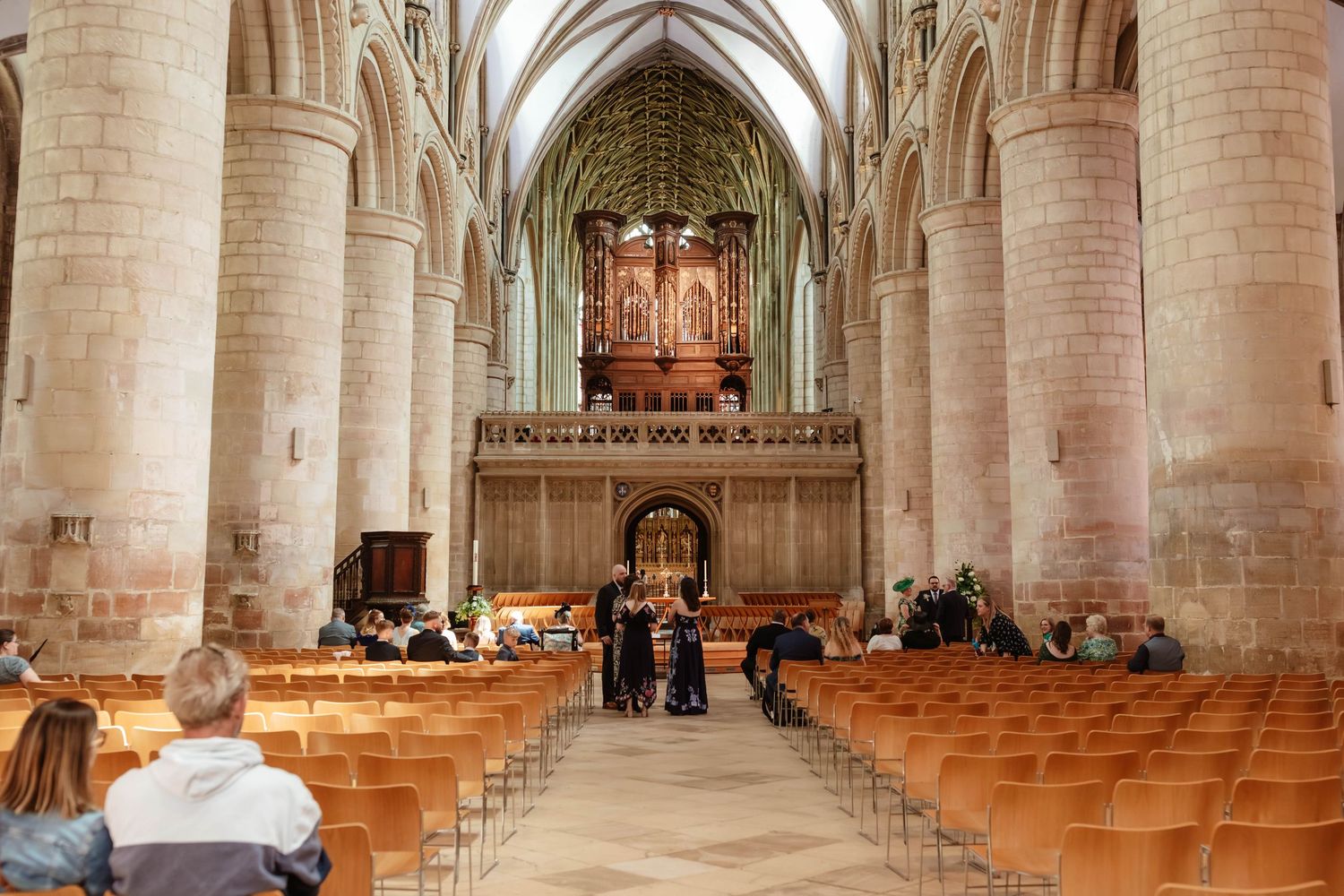 Gloucestershire Wedding Photographer Cotswolds Cheltenham Gloucester Cathedral wedding ceremony in the nave
