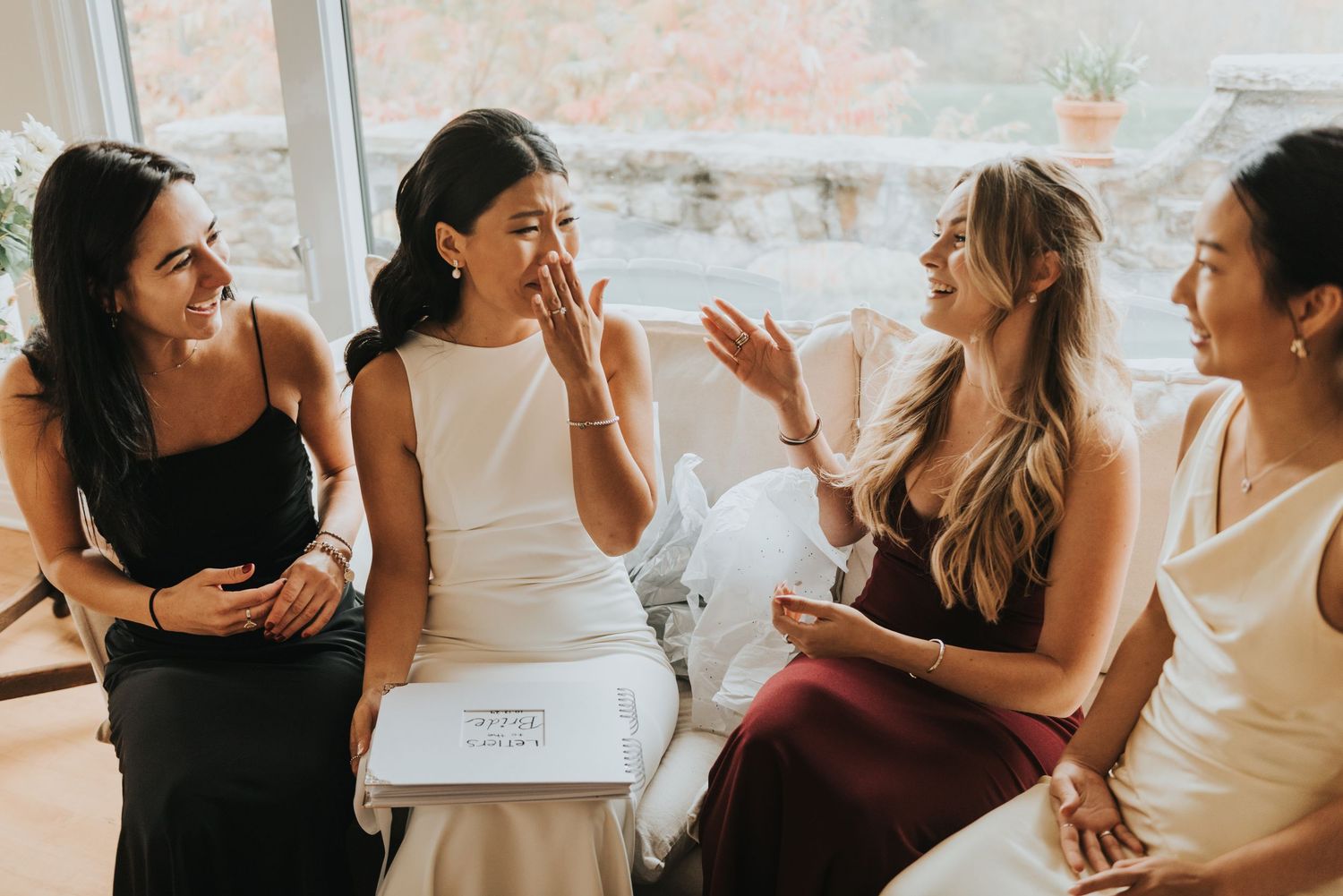 A candid sequence of a joyful celebration showing people gathered in a bright room.