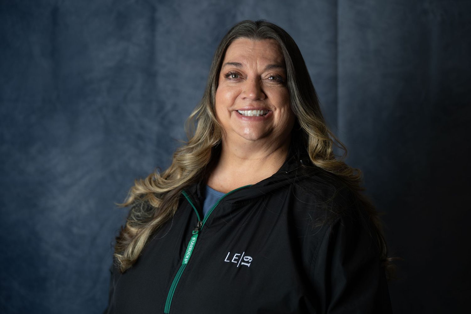 Professional headshots showing smiling person against dark textured backdrop.