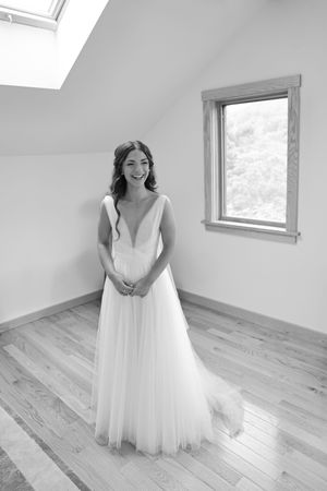 Sequence of wedding preparation photos in a bright white room with hardwood floors and skylights.