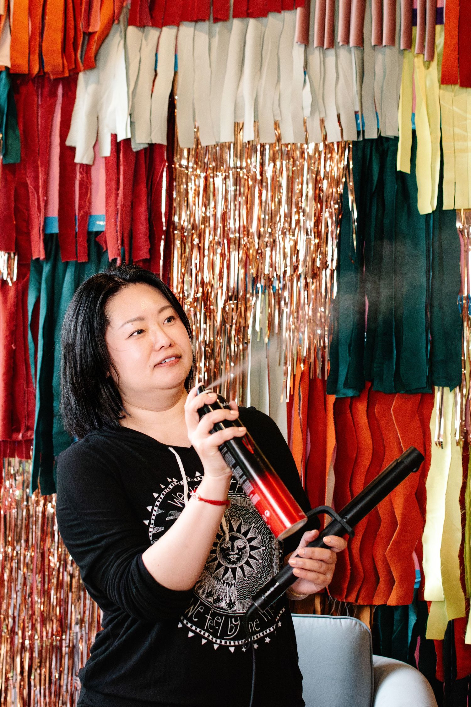 Bridal stylist Lisa Liu working with her tools at Seattle branding shoot