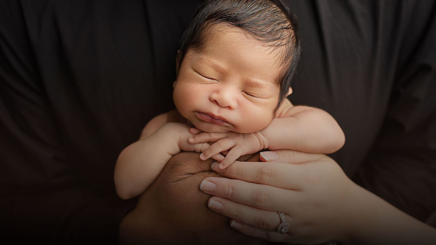 Newborn photographer Springfield Lakes, Ipswich, and Logan – baby wrapped in knitted fabric, safe studio portraits for families near Ripley