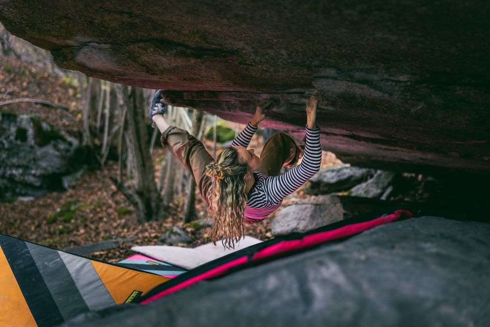 Czech climber Jana Svecova bouldering in Ticino, Switzerland - photo Jan Virt