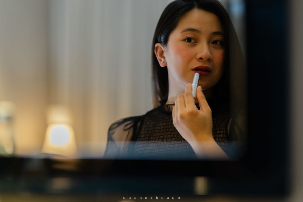 Cinematic portrait series in warm lighting with thoughtful expressions against a neutral background.