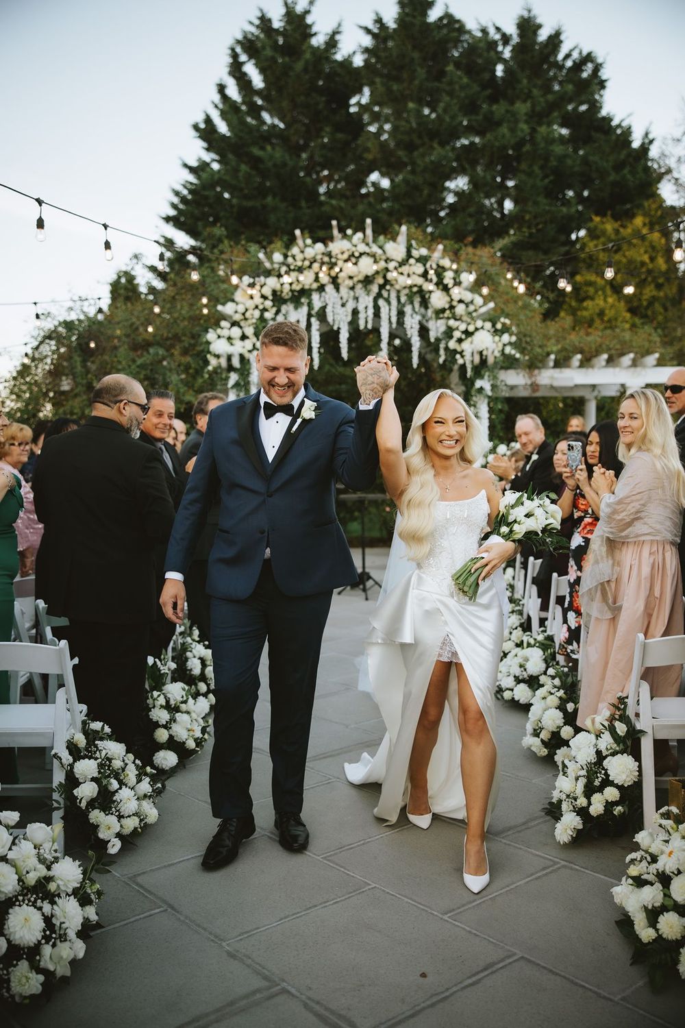 Bride and groom celebrate after wedding ceremony