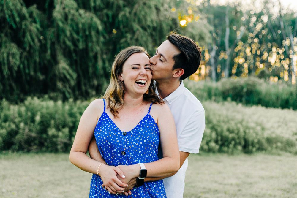 couple in park laughing