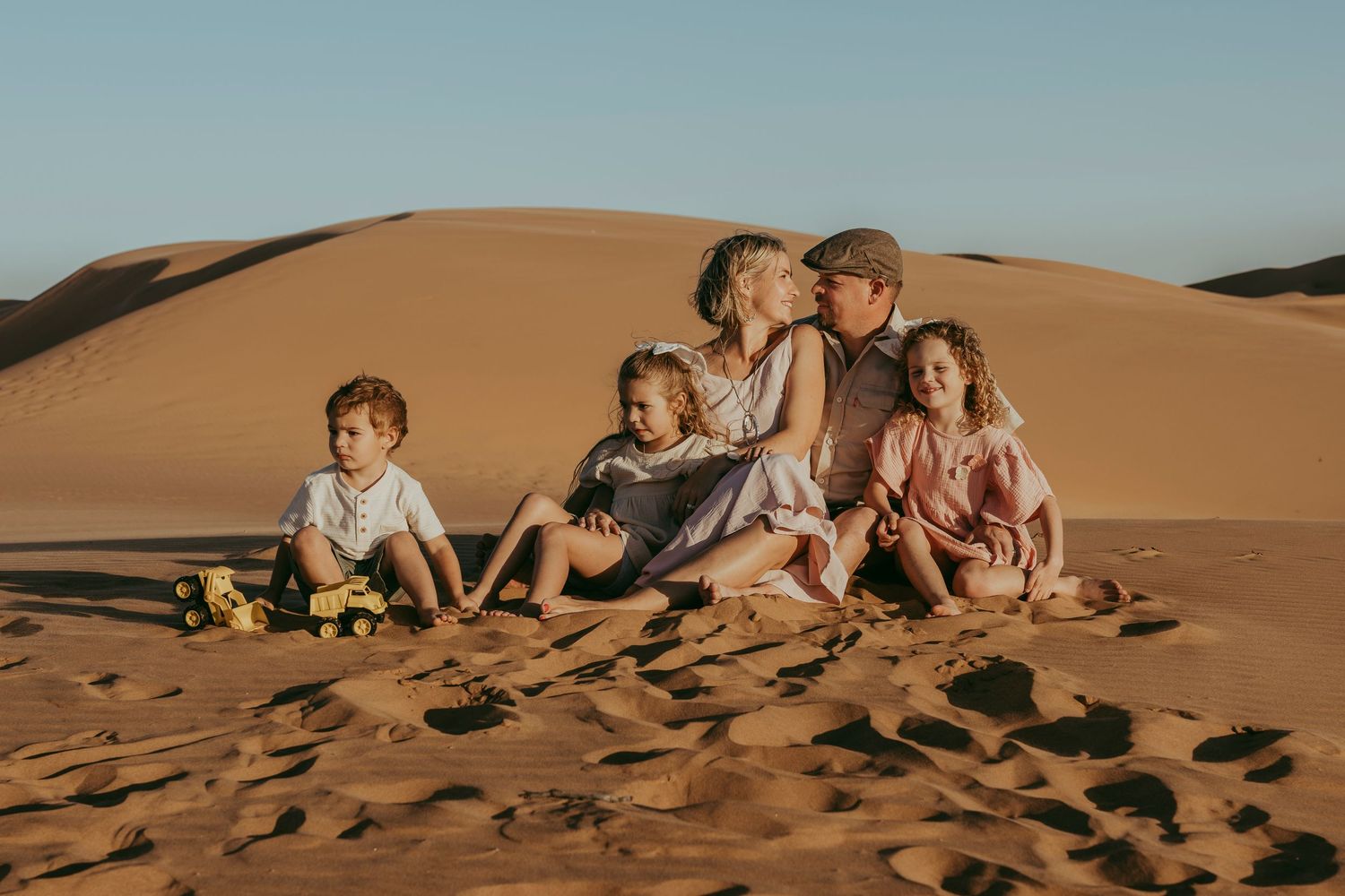 South African family capturing unforgettable memories in Swakopmund during a professional photoshoot experience.