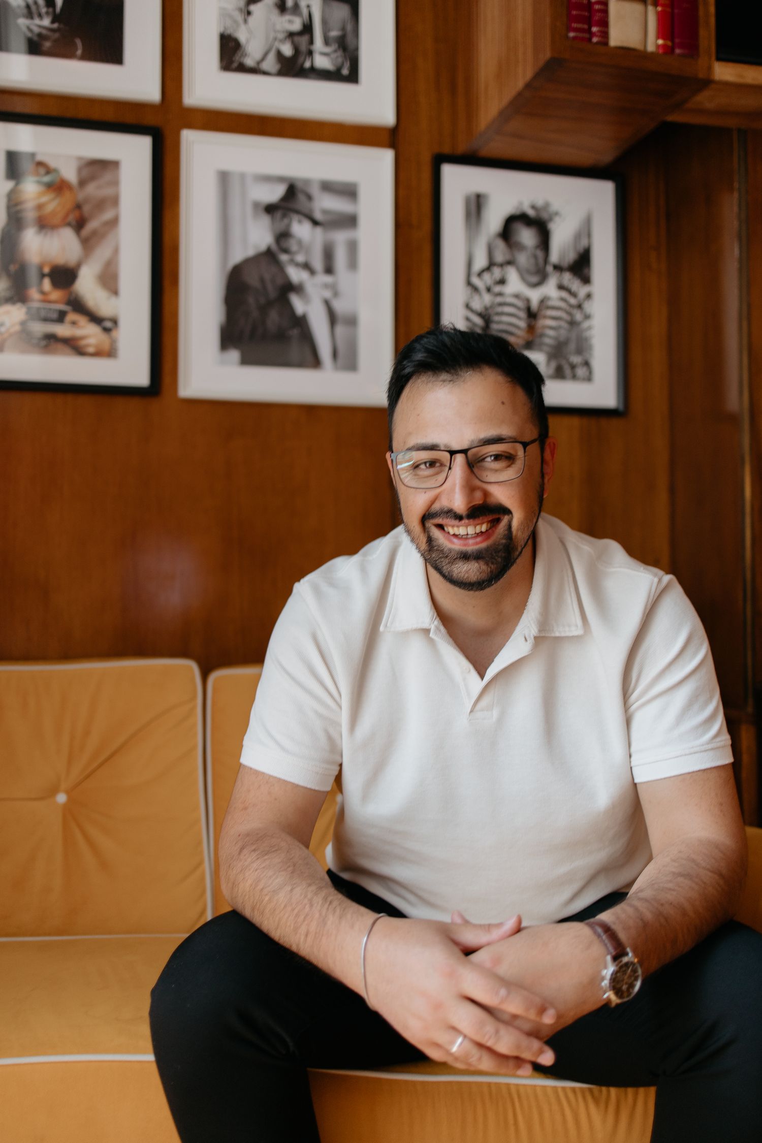 Portrait series of person in white polo shirt against dark backdrop.