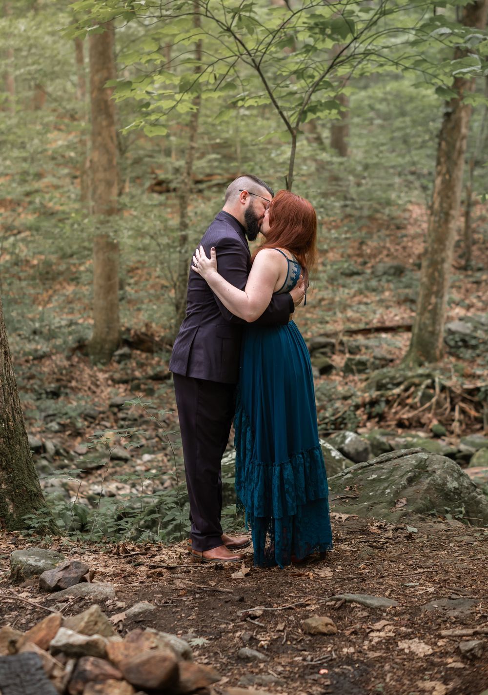 couple kissing wedding ceremony