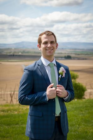 groom at Garman Hill wearing blue suit