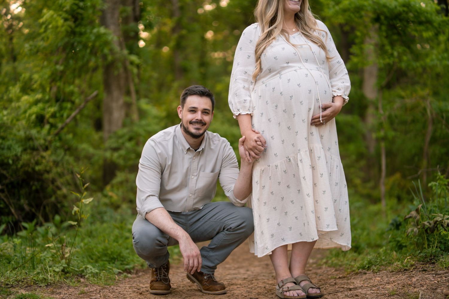 Pregnant wife with husband at a Marietta park maternity session