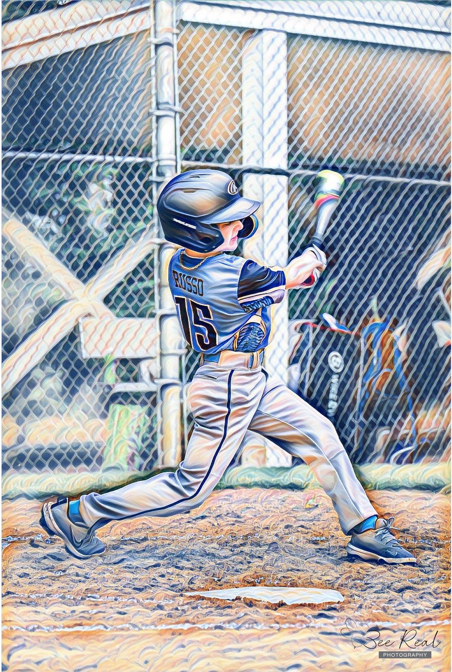 Baseball player in striped uniform swings bat during game with perfect form against chain link fence.