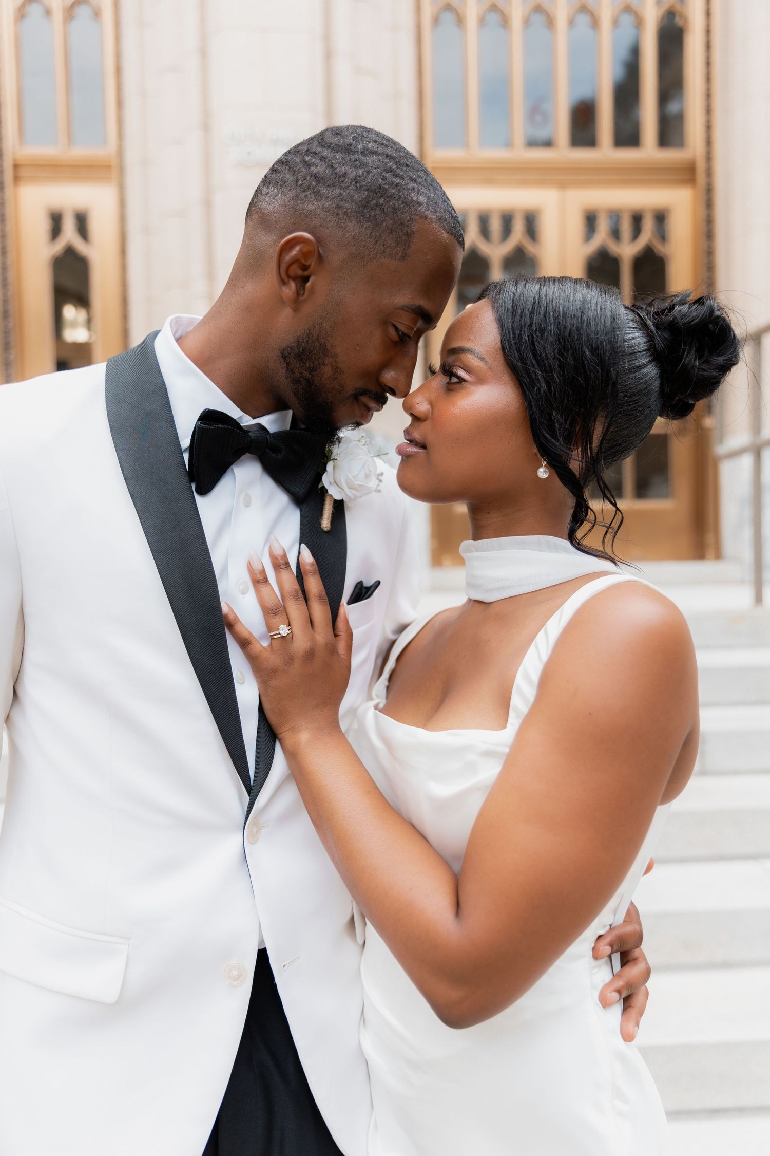 Elegant bride and groom posing together in formal wedding attire – classic Atlanta wedding portrait session.