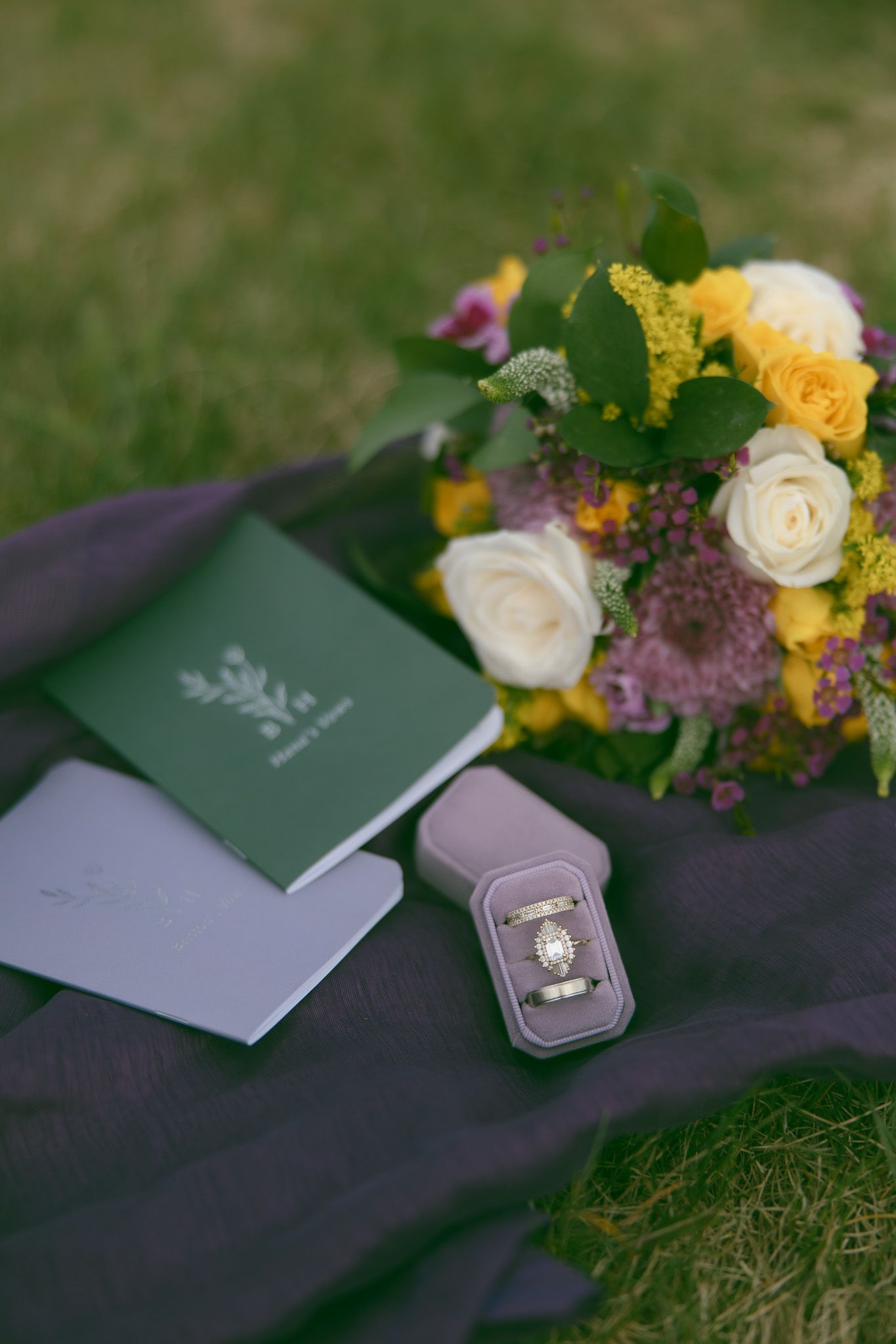rings, florals, vow books during romantic elopement at blue ridge mountain overlook near Asheville, North Carolina