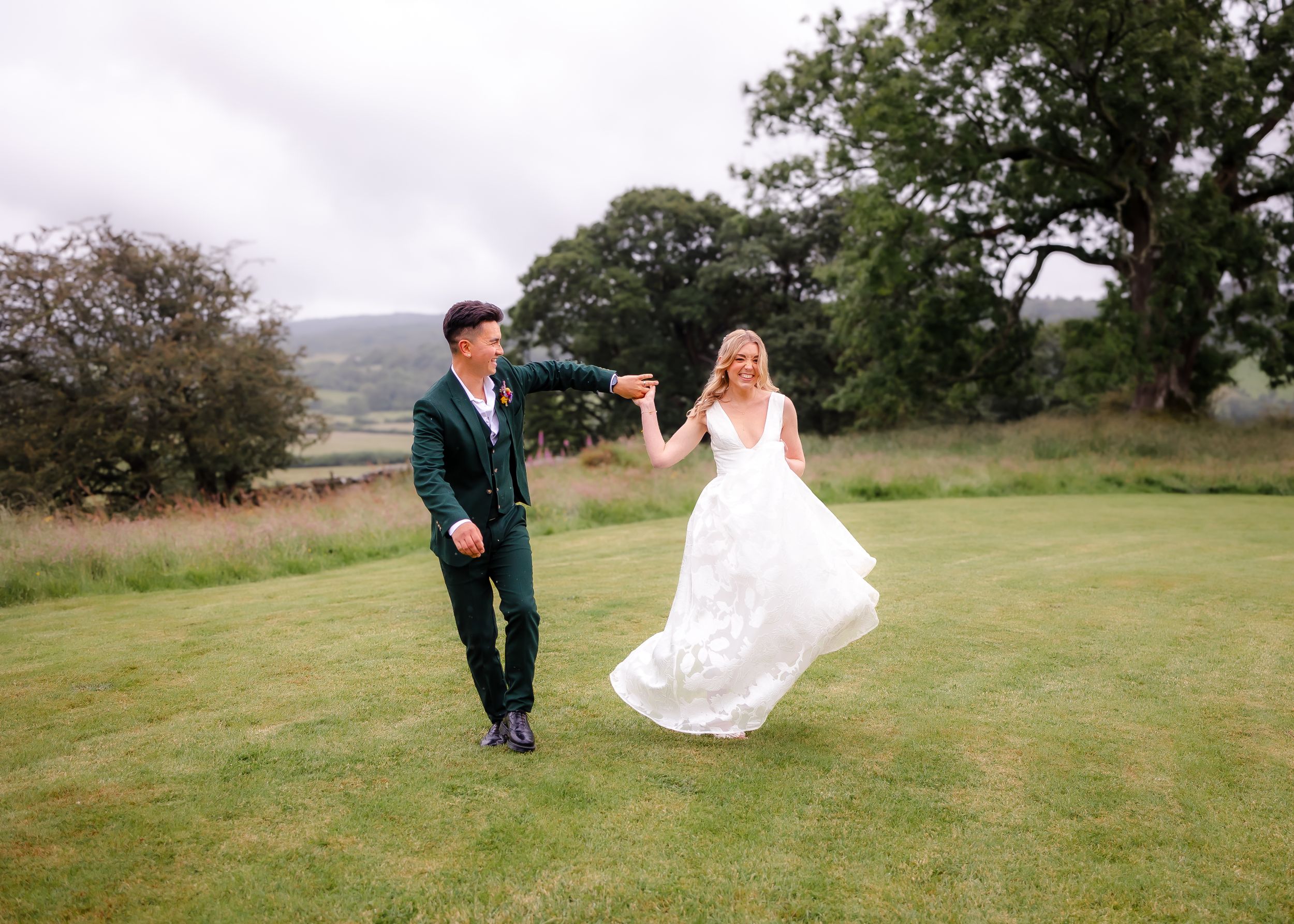 non-traditional wedding photographer in the Lake District - bride and groom dancing