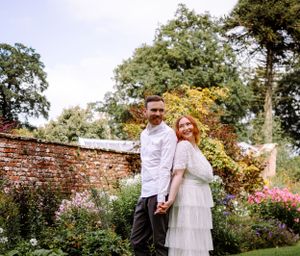 non-traditional wedding photographer in the Lake District - walled gardens bride and groom portrait