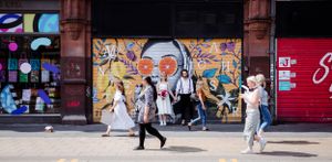 non-traditional wedding photographer bride and groom in the street