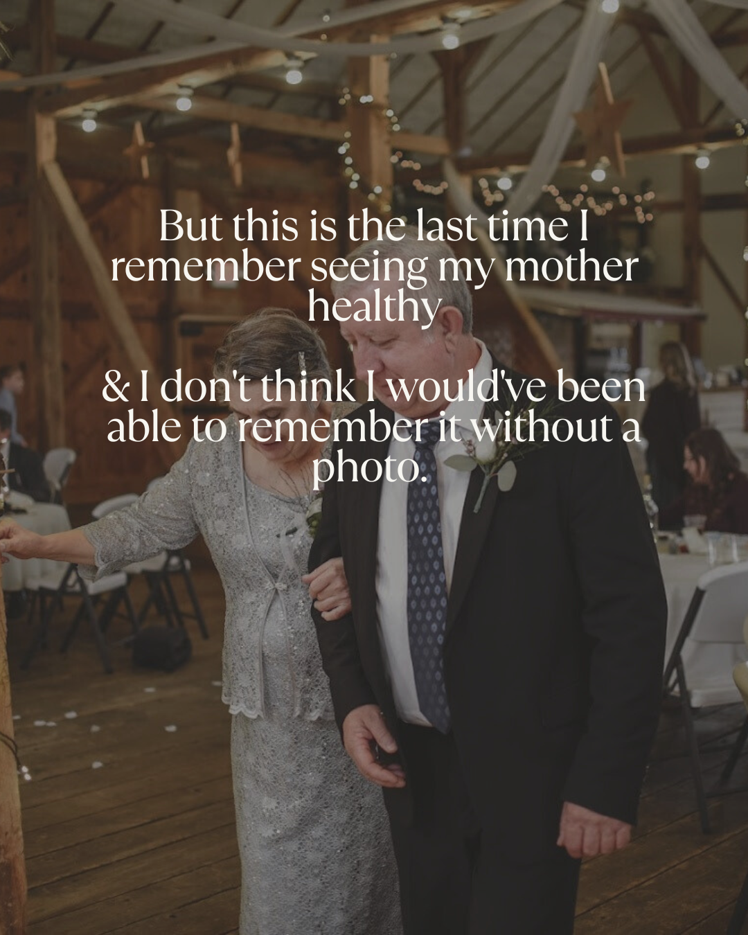 Wedding guests in formal attire dance and celebrate on a rustic wooden dance floor under string lights.