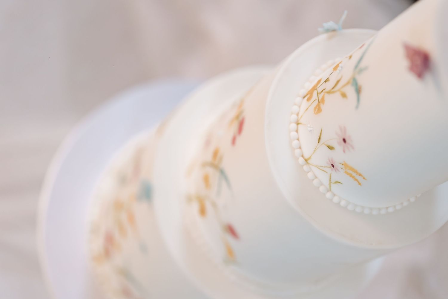 Wedding cake spring design at barn wedding venue.