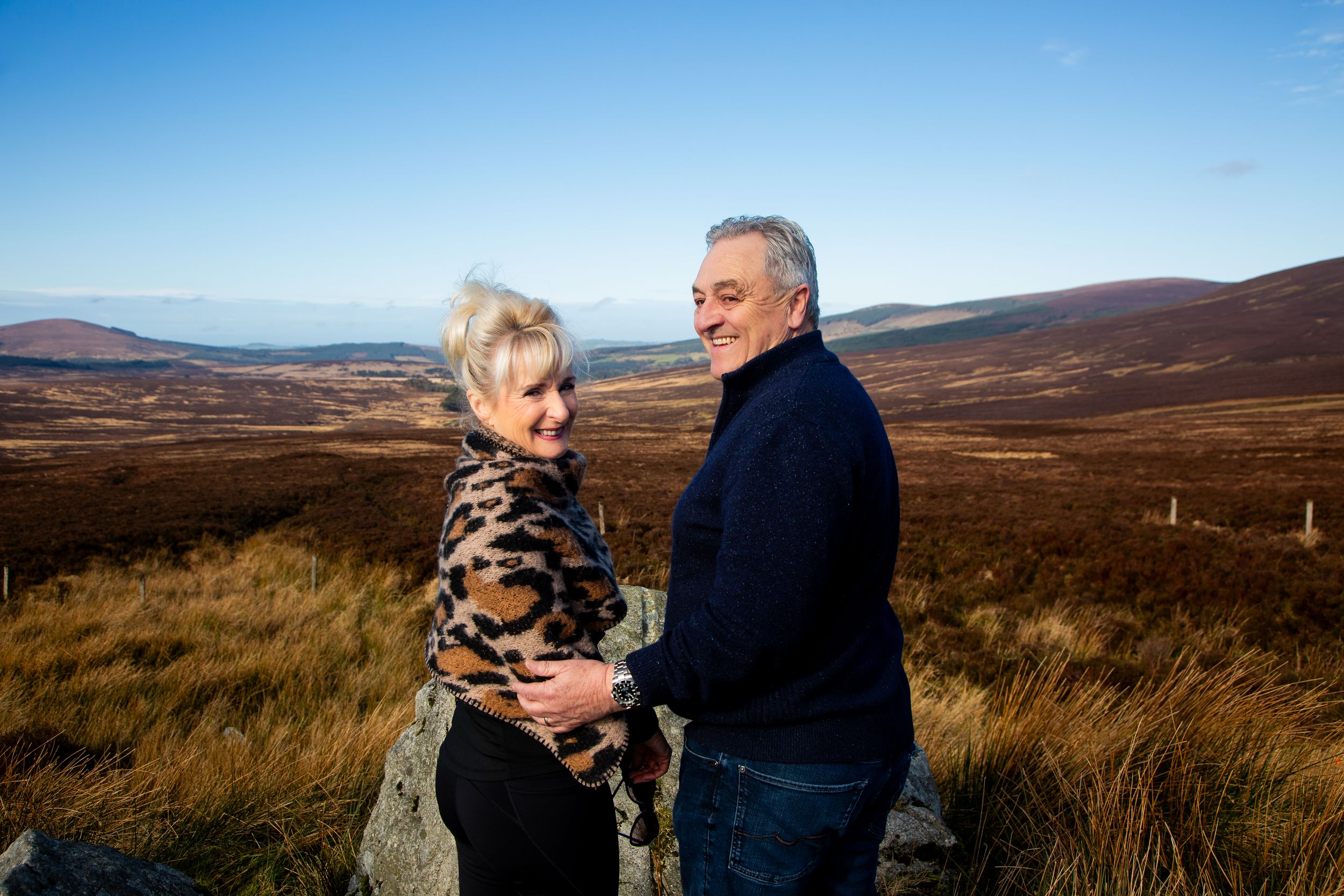 Couple sharing an intimate moment during their guided tour of the panoramic wicklow mountains