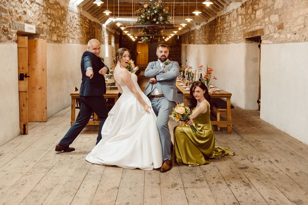 A series of wedding celebration photos in a rustic stone venue with string lights and wooden floors.