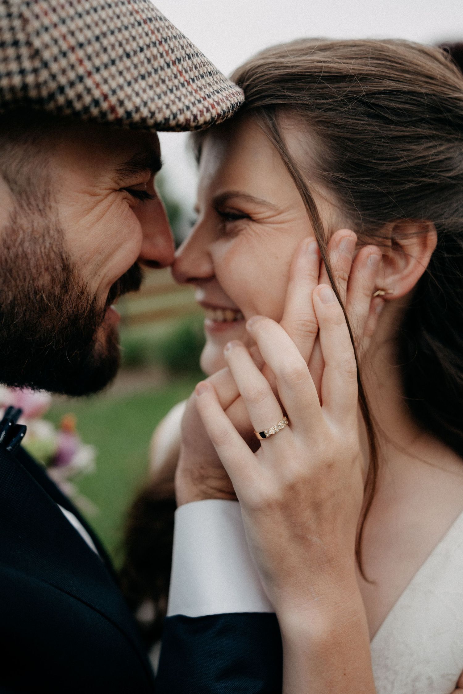 Close-up romantic sequence of a couple sharing tender kisses and intimate moments during their wedding celebration.