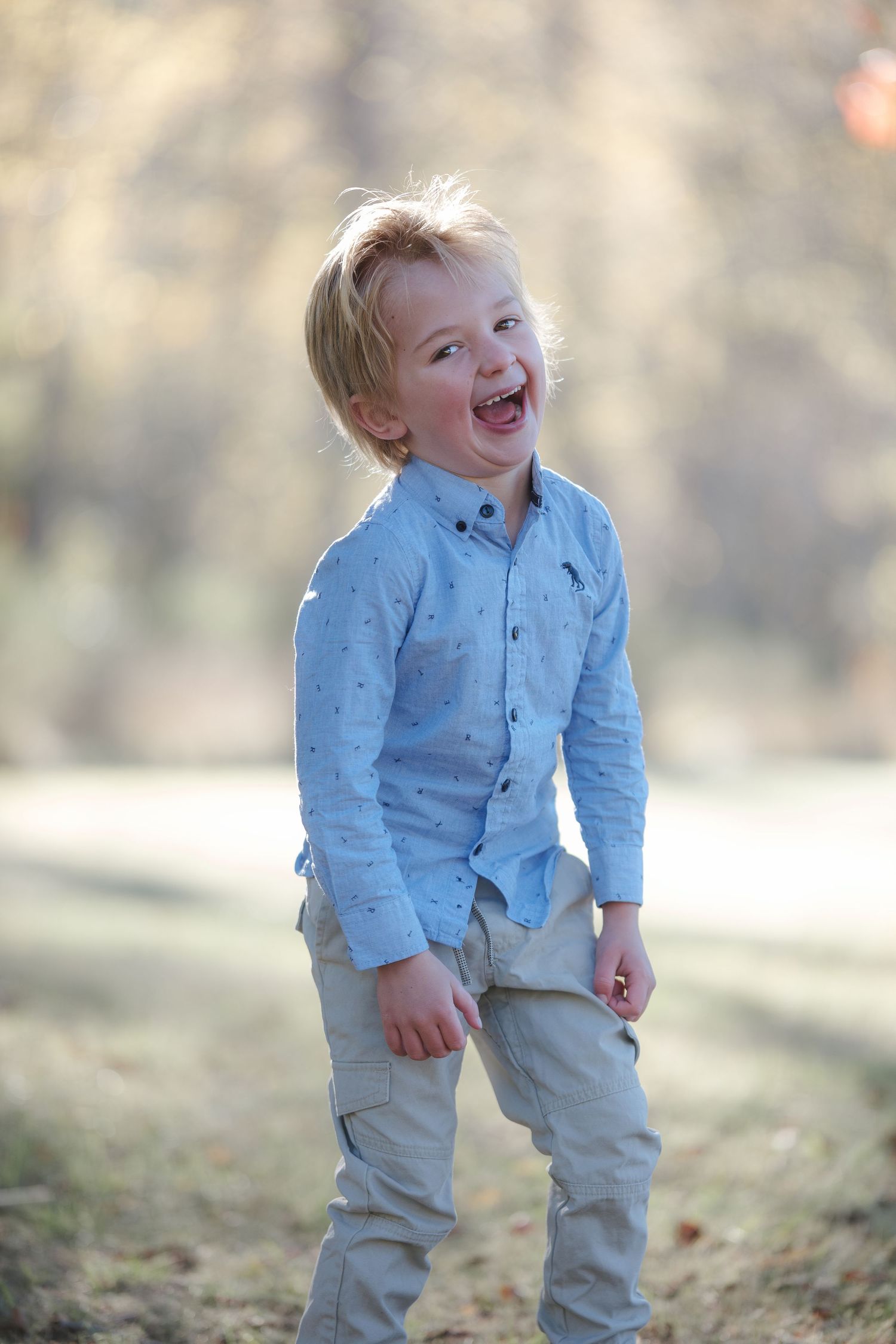 Child smiling with joy for portrait photo