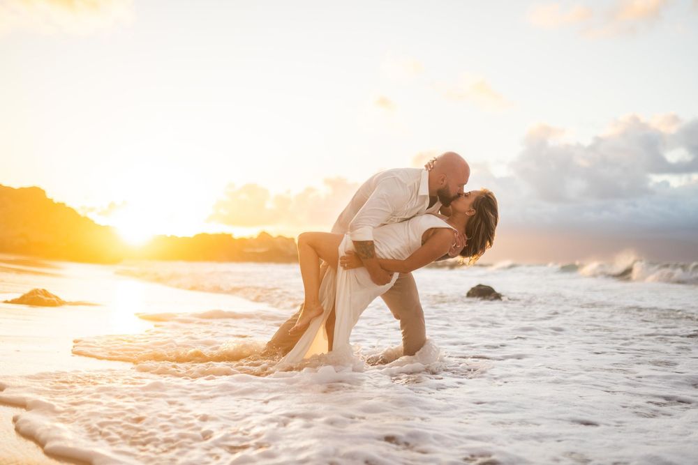 Wedding couple photo shoot during sunset beach on Maui Hawaii by ohwowfotos