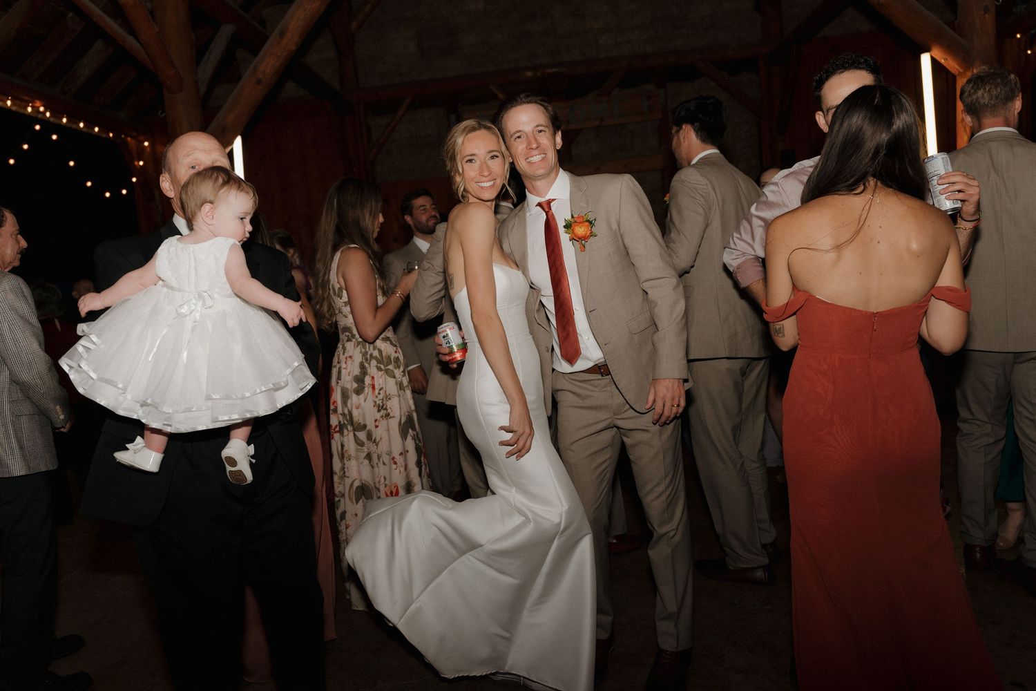 A collection of candid dance floor moments from a wedding reception showing guests celebrating and dancing together.