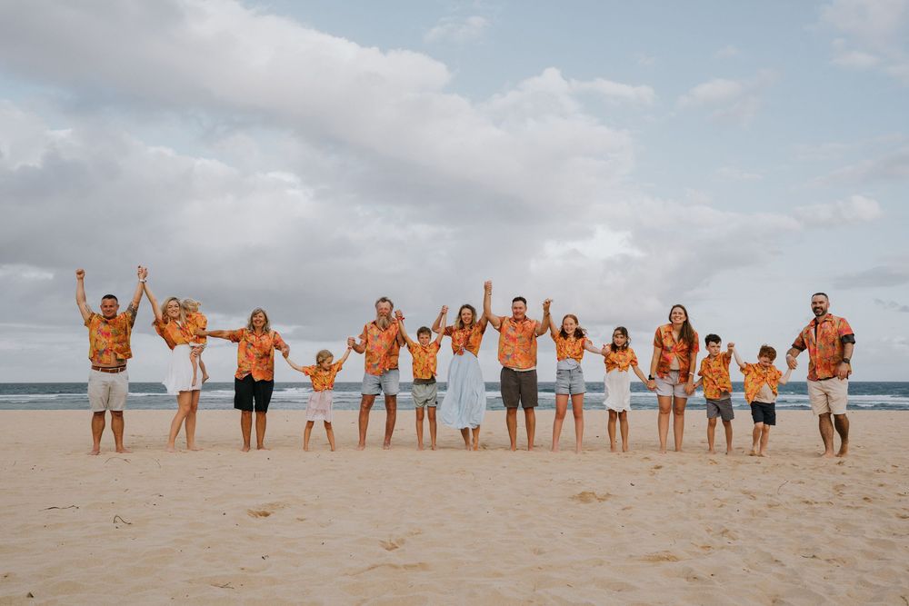 Group holiday photography services with a beach background.