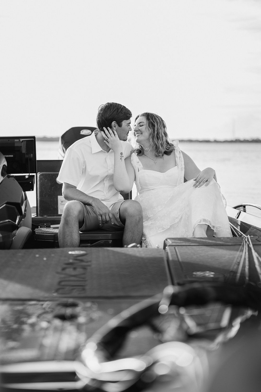 Black and white photo sequence showing a romantic couple sharing tender moments in a car.
