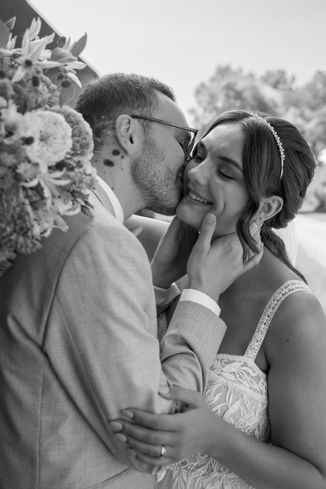 Series of romantic wedding kiss photos showing tender moments between newlyweds outdoors.