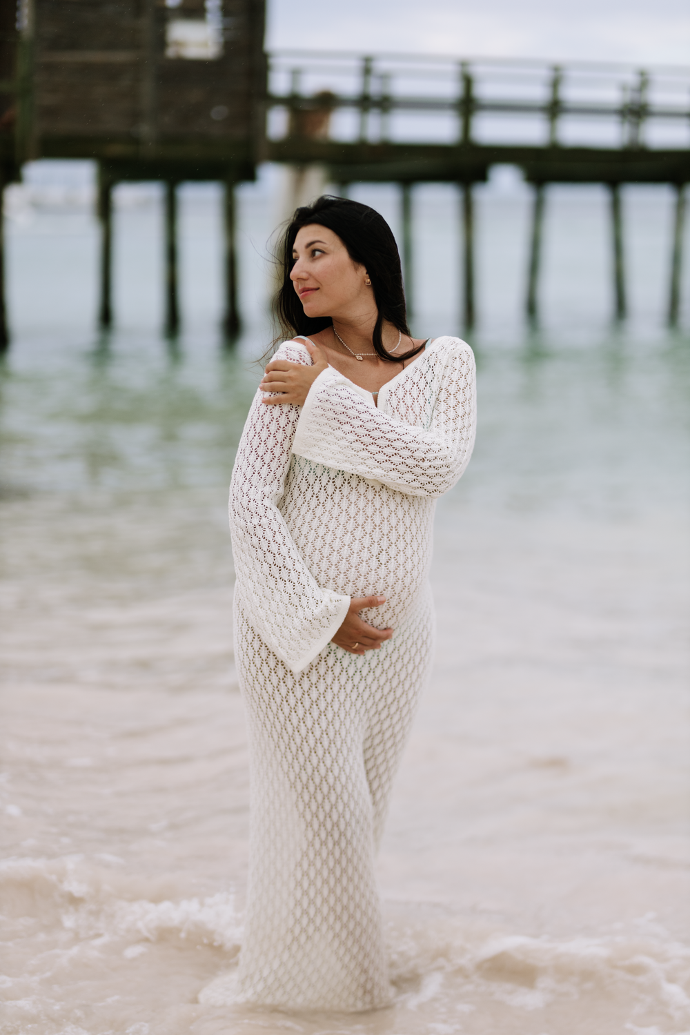 Elegant maternity portraits in Cap Cana with stunning ocean views and natural light.