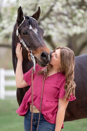 girl with bay horse