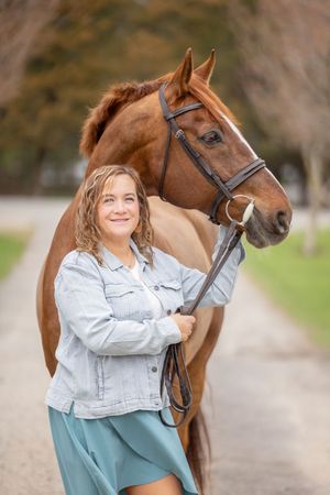 woman with chestnut horse