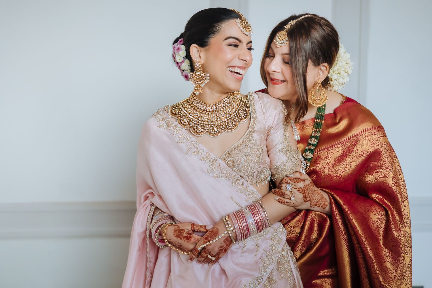 Bride Leah embracing a soft pastel bridal palette for her Punjabi wedding at Tivoli Chattarpur