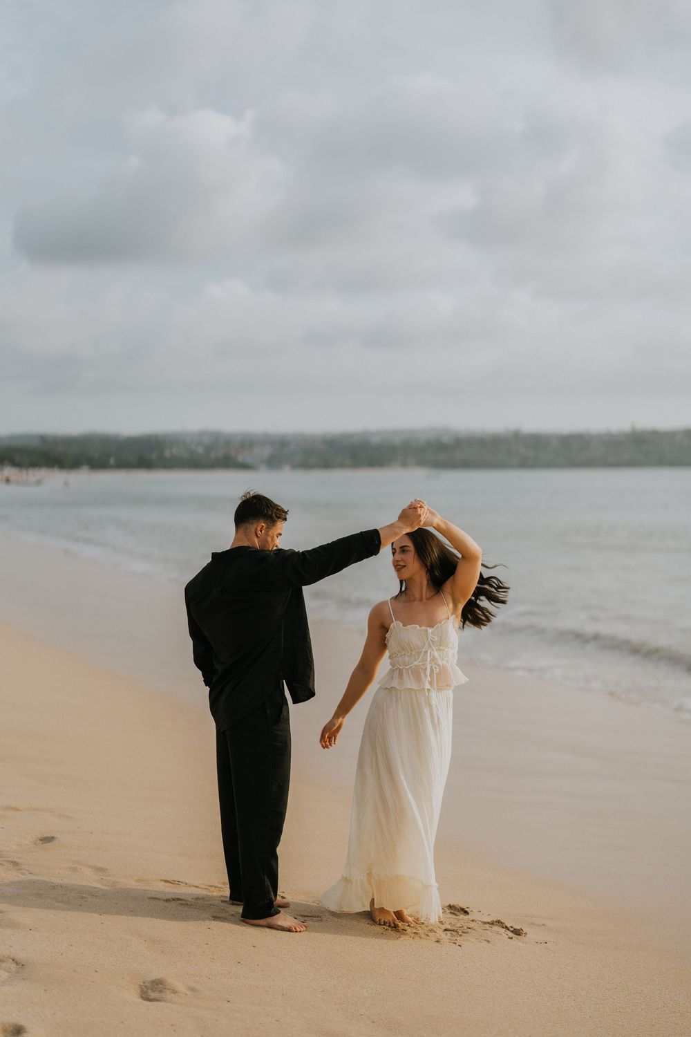 Couple photography services at sunset beach Bali