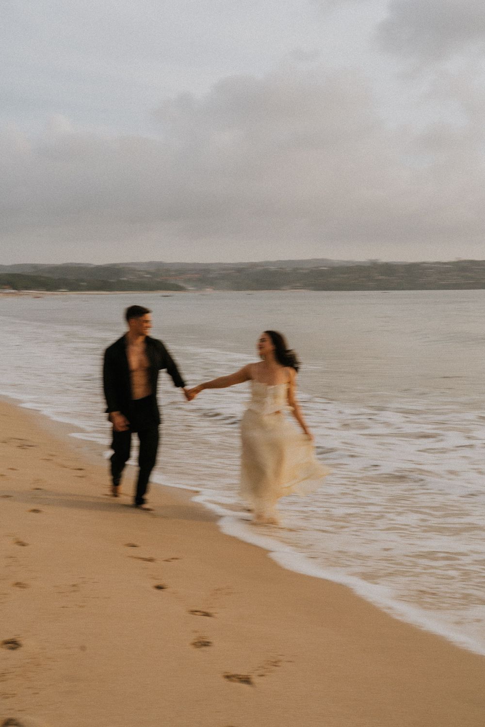 Couple photography services at sunset beach Bali