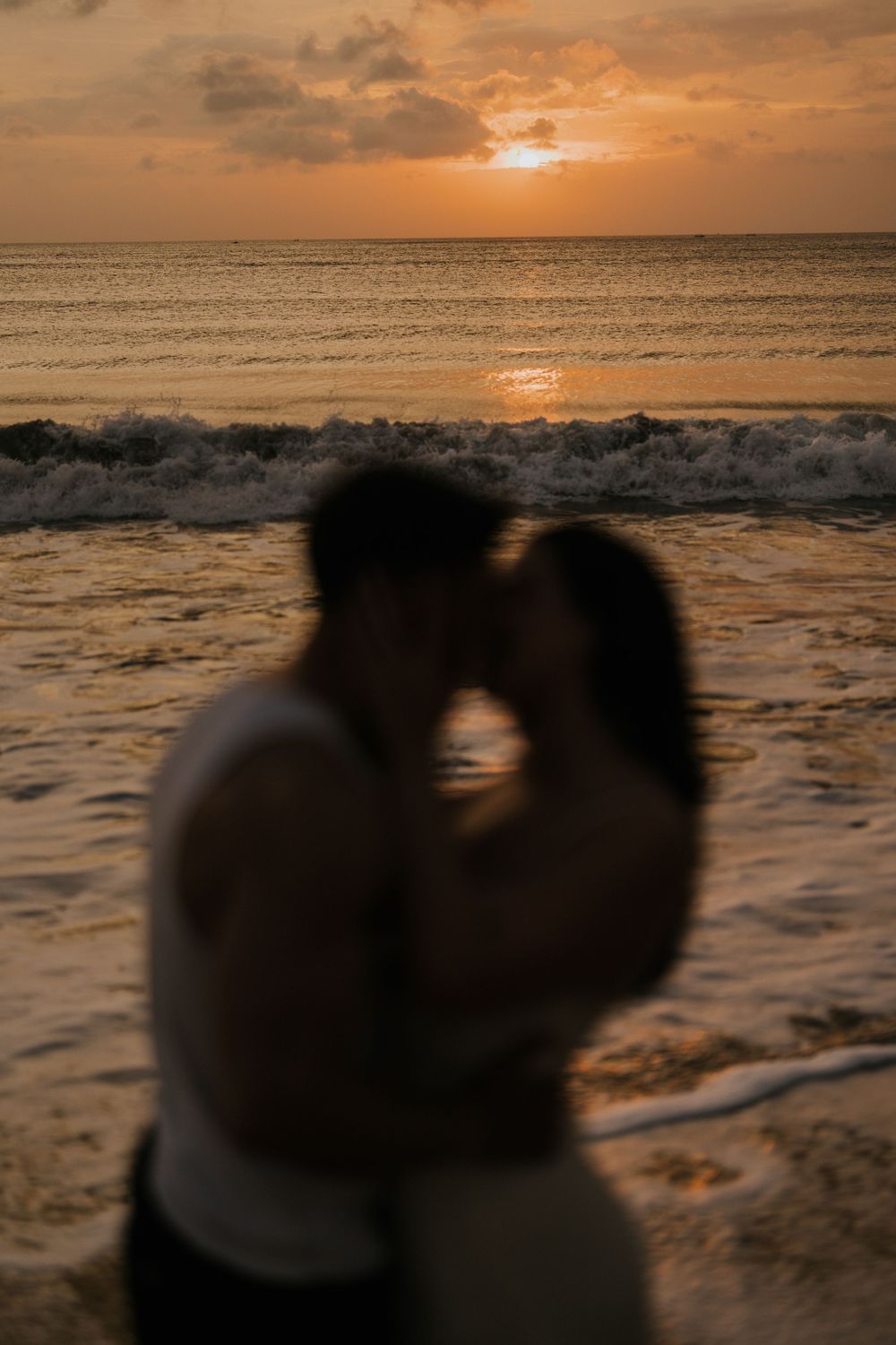Couple photography services at sunset beach Bali