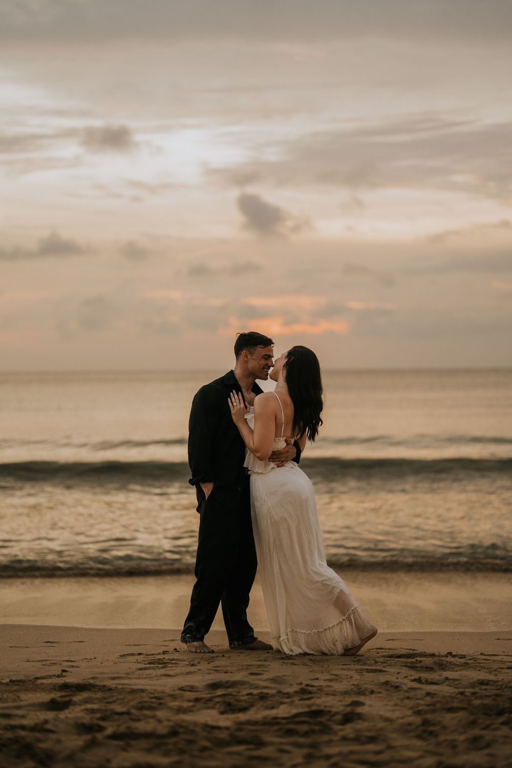 Couple photography services at sunset beach Bali