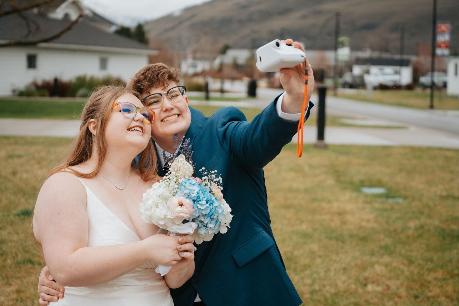 Five heartfelt wedding moments captured in a series of joyful outdoor celebration photographs with blue floral bouquets.