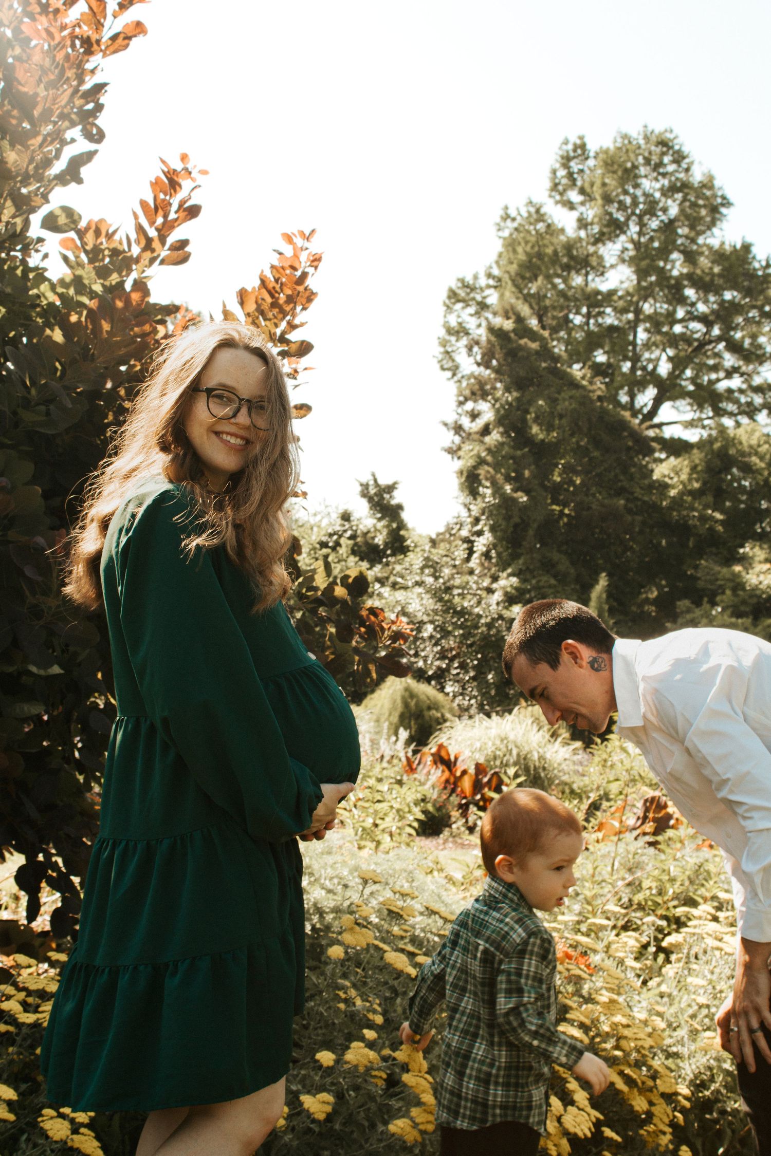 Family Running Around in Will Rogers Gardens for a Maternity Session