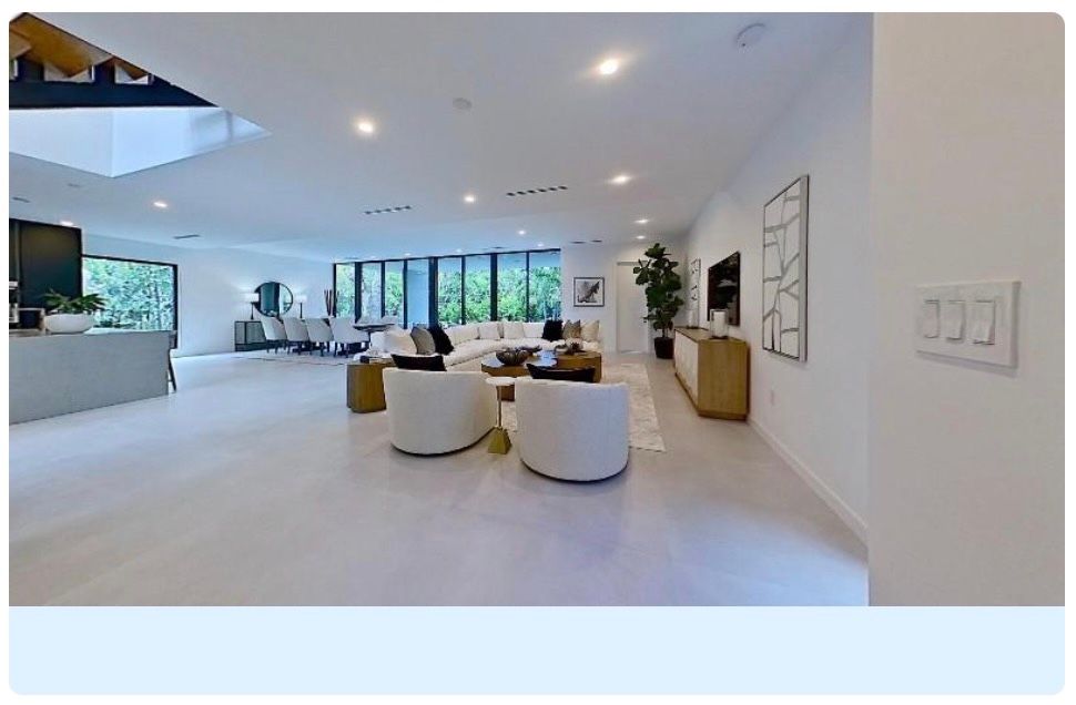 Multiple interior views of a modern minimalist home with white walls, featuring a 3D interactive floor plan presentation.