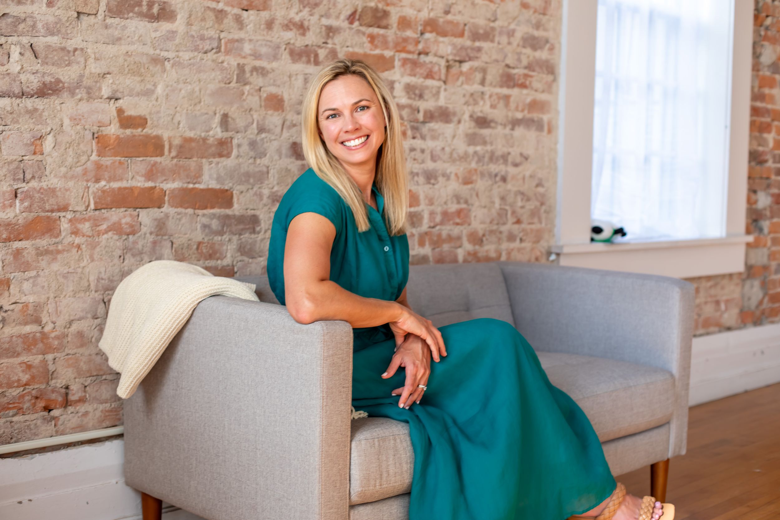 Professional author headshot in Cincinnati studio with polished lighting and modern styling for high-end personal branding