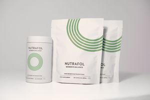 Nutrafol hair wellness product displayed for Cincinnati Skin Center website store targeting premium health and beauty clientele