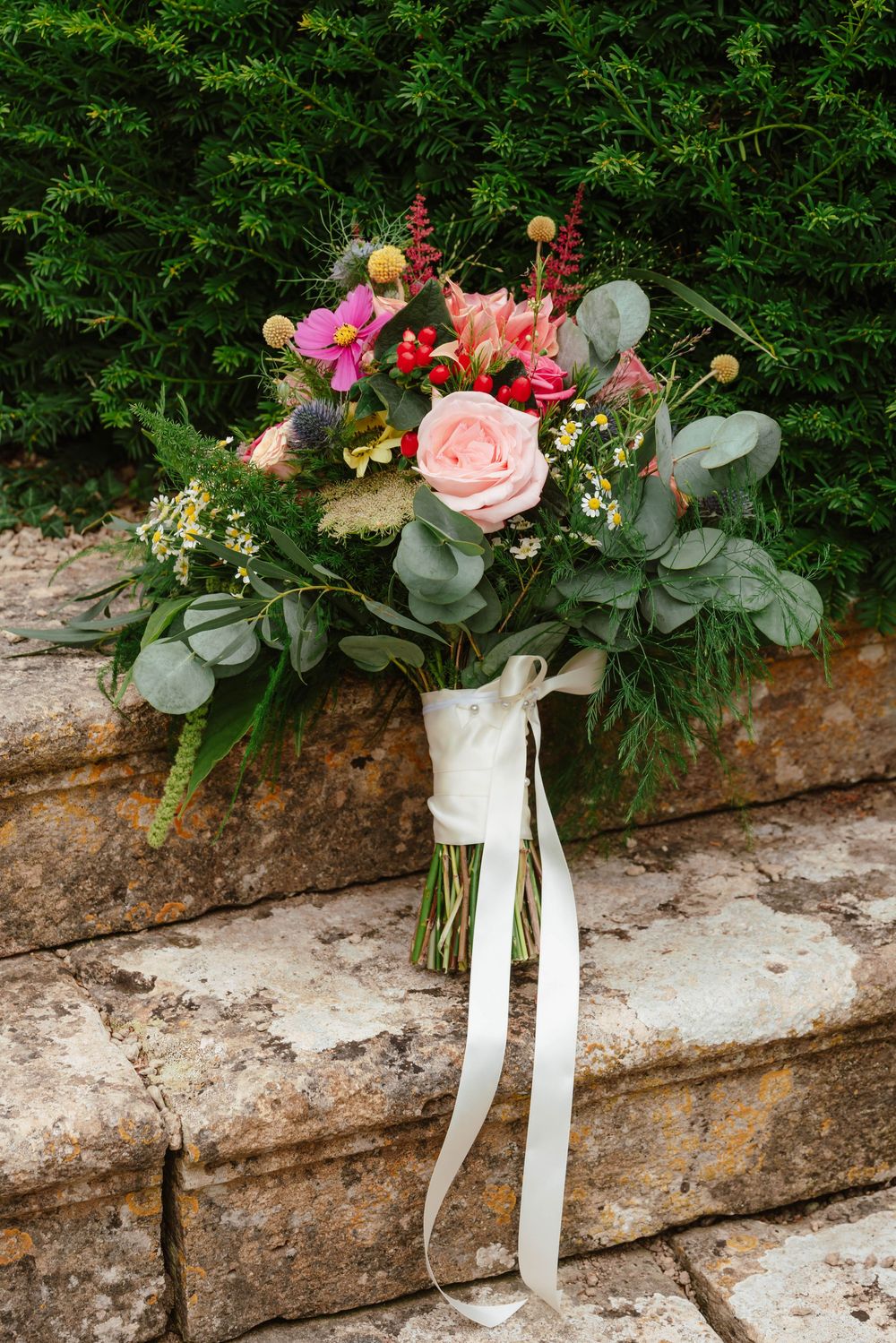 Owlpen Manor wedding photographer Zara Davis Photography Cotswolds Gloucestershire bridal bouquet outside