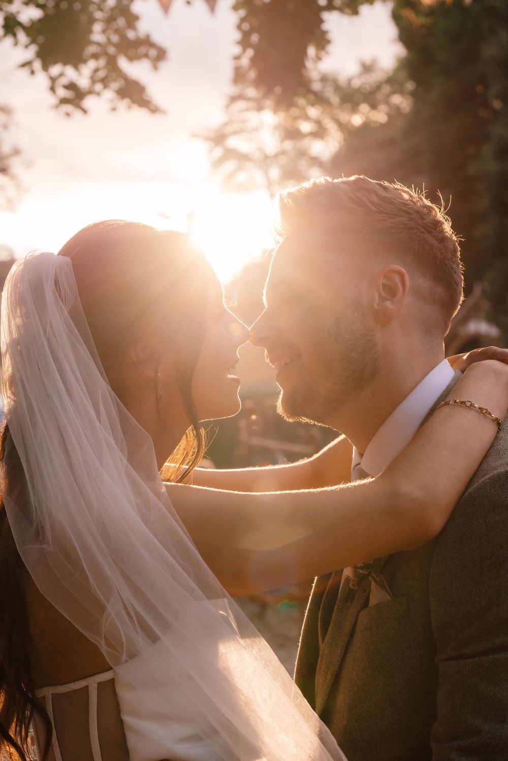 Owlpen Manor wedding photographer Zara Davis Photography Cotswolds Gloucestershire bride and groom portrait at sunset